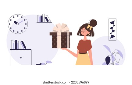 Gift concept for christmas or new year. A young woman holds a gift in her hands.