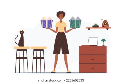 Gift concept for christmas or new year. A woman is holding a festive gift box.