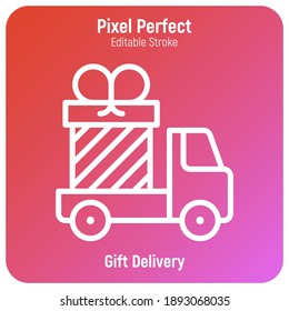 Gift delivery: truck with big present. Logo for transportation service. Thin line icon. Pixel perfect, editable stroke. Vector illustration.