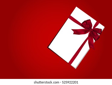 Gift giving Red ribbon with bow on red background.