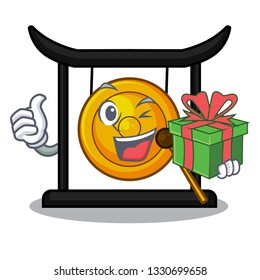 With gift golden gong isolated with the mascot