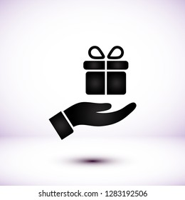 a gift in the hand icon