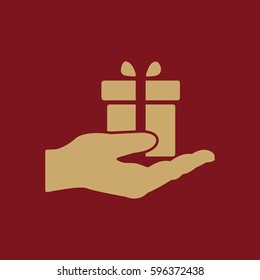 Gift in hand icon. Birthday, present, surprise symbol. Flat design. Stock - Vector illustration