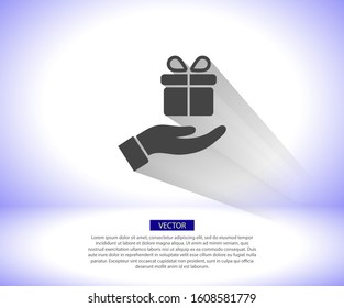a gift in the hand icon , lorem ipsum Flat design