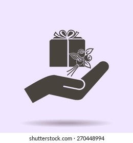 gift and hand vector icon