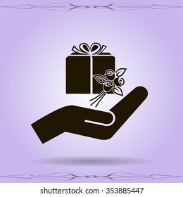 gift and hand vector icon