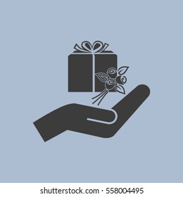 gift and hand vector icon