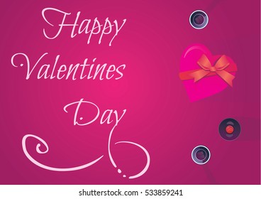 Gift , the heart and the bottle of red wine for a romantic holiday 