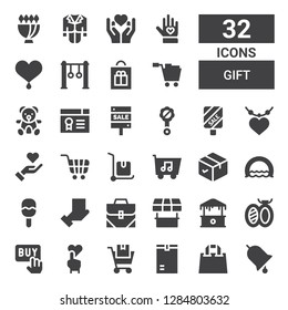 gift icon set. Collection of 32 filled gift icons included Ring, Shopping bag, Package, Shopping cart, Heart, Buy, Brooch, Mall, Store, Bag, Rattle, Delivery cart, Give love, Pendant