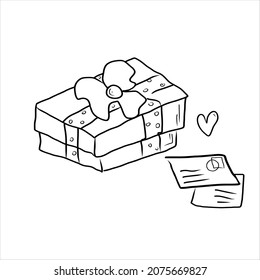Regalo y sobre postal con carta o tarjeta con corazones. dibujo a mano alzada, garabato.