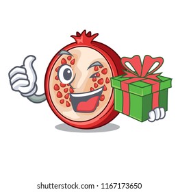 With gift mascot half of fresh pomegranate fruits