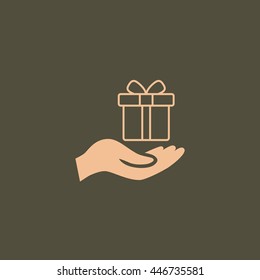 Gift on the hand icon Vector.