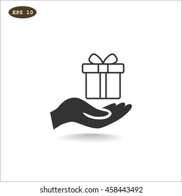 Gift on the hand icon Vector.