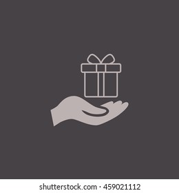 Gift on the hand icon Vector.