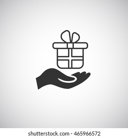 Gift on the hand icon Vector.