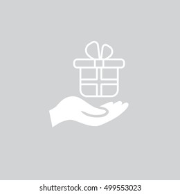Gift on the hand icon Vector.