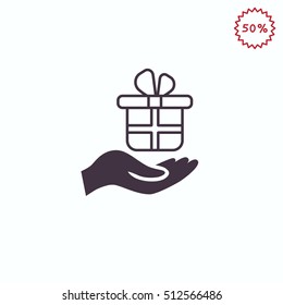 Gift on the hand icon Vector.