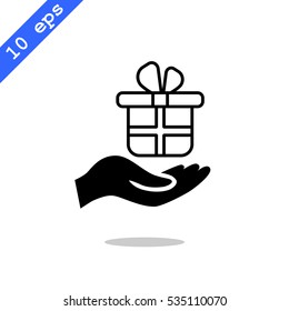 Gift on the hand icon Vector.