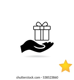 Gift on the hand icon Vector.