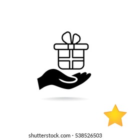 Gift on the hand icon Vector.