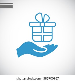 Gift on the hand icon Vector.