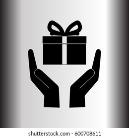 gift on the hands vector icon