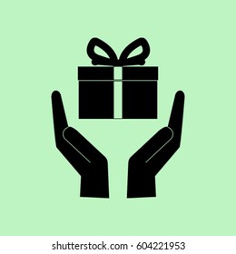 gift on the hands vector icon