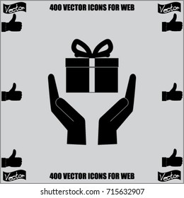 gift on the hands vector icon