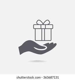 gift on his hand web icon. vector design