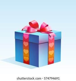Gift packed in a box and tied with a ribbon. Blue.
