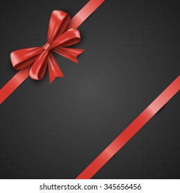 Gift realistic red bow and ribbons tilted on a black background. Beautiful vector illustration EPS10