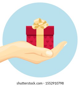 Gift in a red box with a golden bow in hand. Hand holds a present. Vector illustration in cartoon simple flat style. 