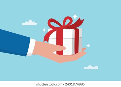 Gift reward program, bonus or surprise present for customer, employee reward or lucky prize, birthday gift box or festive incentive, special loyalty program concept, hand giving gift box with ribbon.