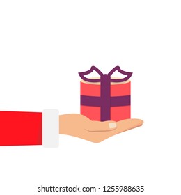 Gift from Santa Claus. Santa Claus holding white gift box in hand. Vector illustration flat design. Merry Christmas and Happy New Year d