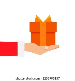 Gift from Santa Claus. Santa Claus holding white gift box in hand. Vector illustration flat design. Merry Christmas and Happy New Year u