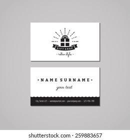 Gift shop and souvenirs business card design concept. Logo with gift box, ribbon  and rays. Vintage, hipster and retro style. Black and white.