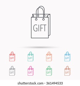 Gift shopping bag icon. Present handbag sign. Linear icons on white background.