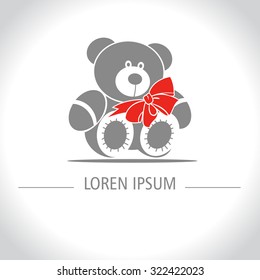 Gift Teddy bear. Toy with a red bow.