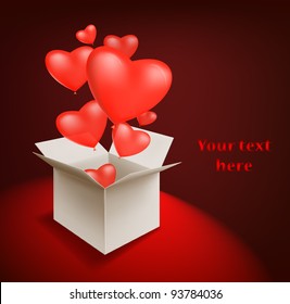 Gift for Valentine Day. Opened box with flying hearts.