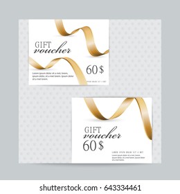Gift voucher with golden ribbon set isolated on gray background.For web site,ads,poster template,placard and promotion material.Also useful for flyer,banner,marketing on social network and blog advert