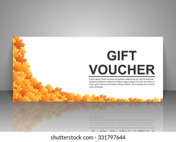 Gift voucher template with autumn background.
