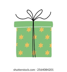 Gift wrapped in green paper with yellow stars and a black ribbon on top