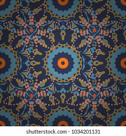 Gift wrapping paper. Abstract vector geometric pattern. Bed sheets and interior. Random layout. Ornament made of various orange, violet and blue shapes.