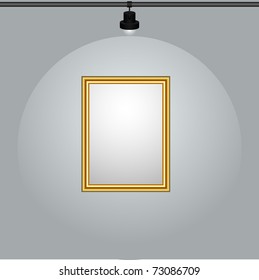 Gilt-framed blank painting hanging on the wall.