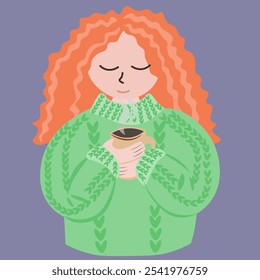 A ginger woman in a green sweater holds hot tea in her hands