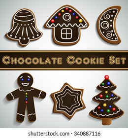 Gingerbread cocolate bell half moon tree man and house with decorations 