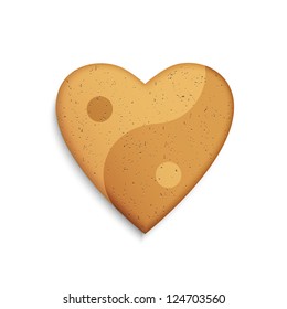 Gingerbread cookie in the shape of a heart with Yin Yang symbol