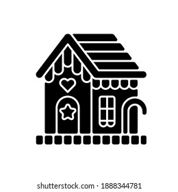 Gingerbread house black glyph icon. Festive treat. Christmas holiday dessert. New Year candy. Ginger cookie decoration. Silhouette symbol on white space. Vector isolated illustration