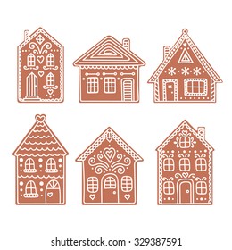 Gingerbread house. Set of vector hand drawn gingerbread houses. Christmas cookies. Brown and white colors.