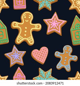 gingerbread and gingerbread men on black background. Seamless pattern.Texture for fabric, wrapping, wallpaper